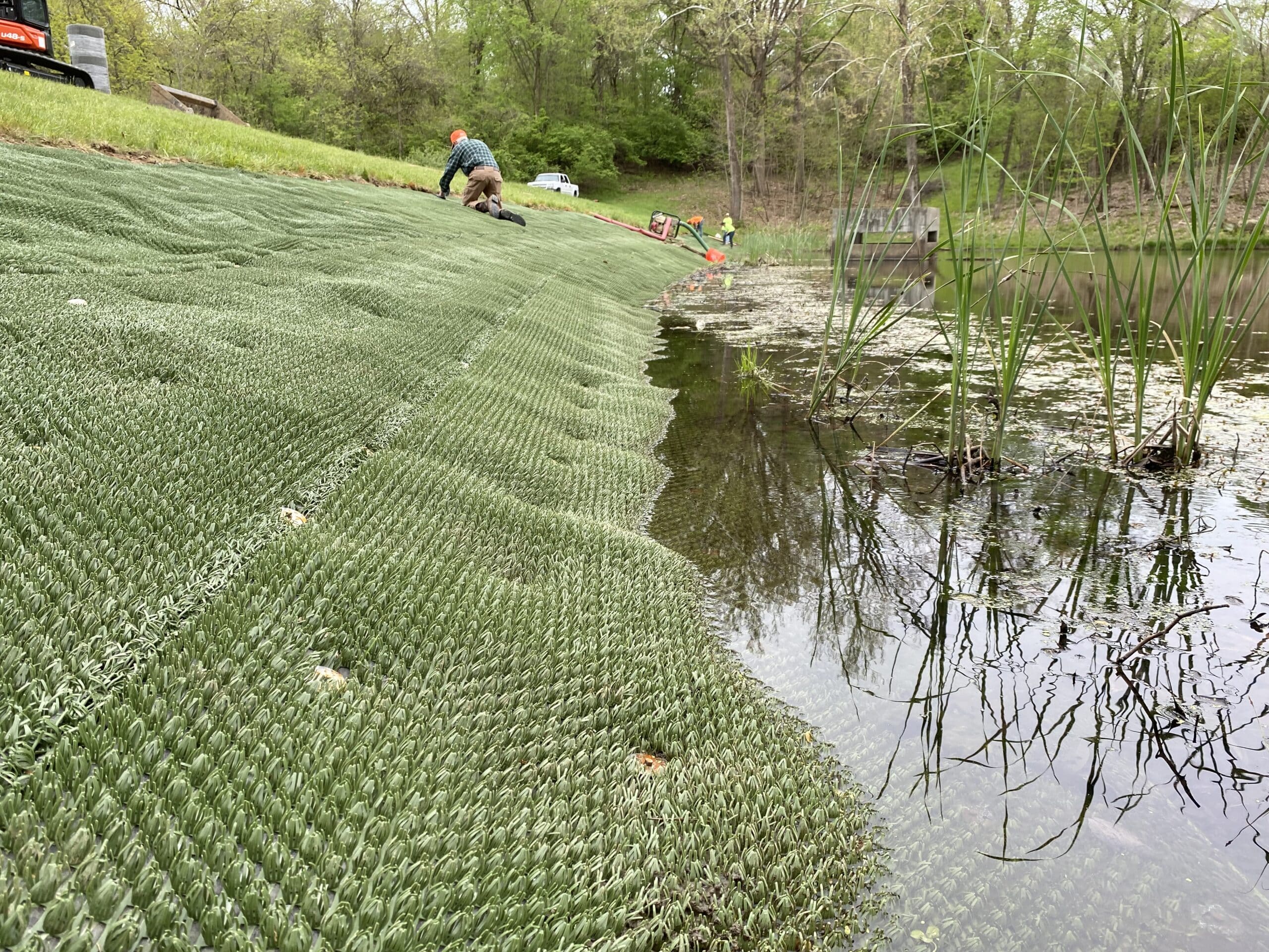 InstaTurf ShearForce10 being installed along pond bank